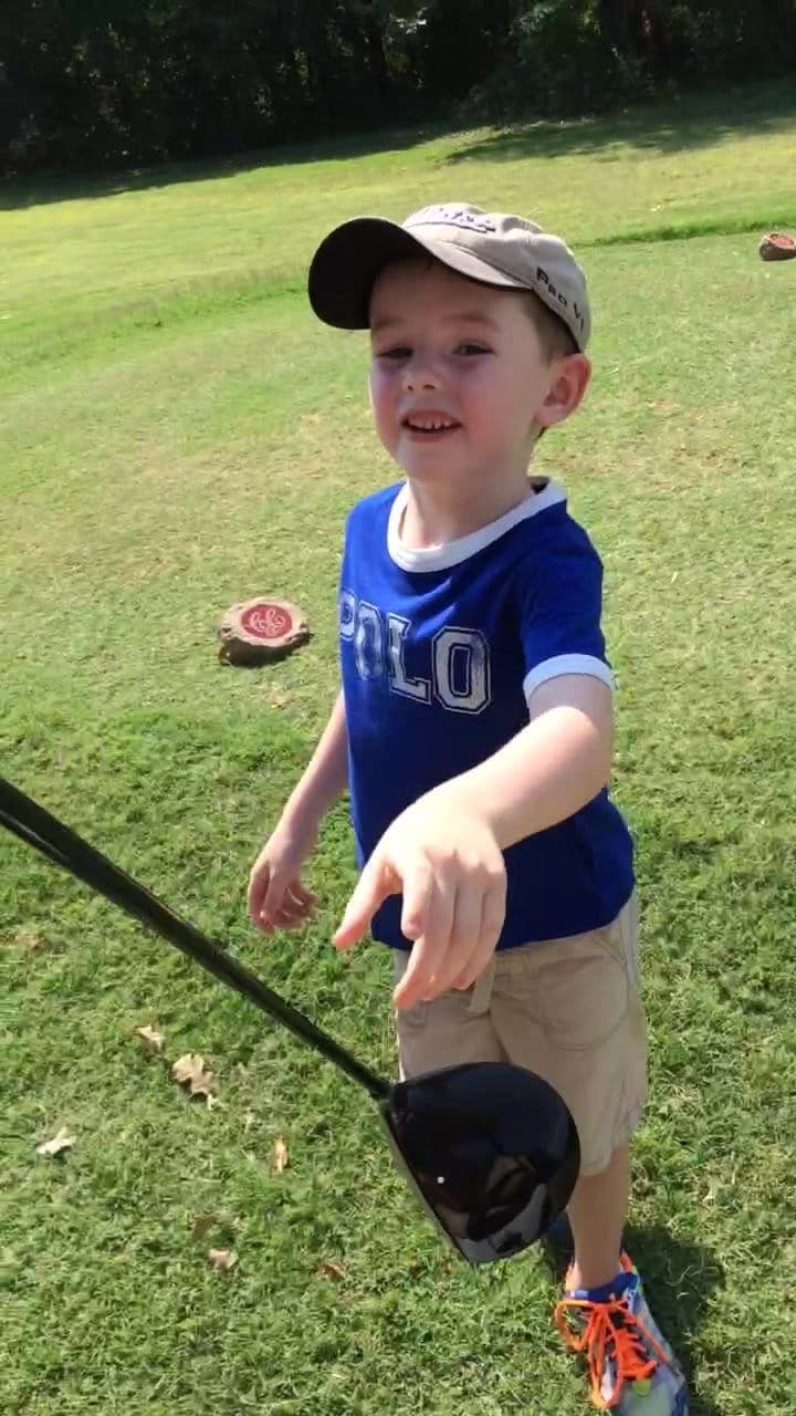 Keaton on the course with a club